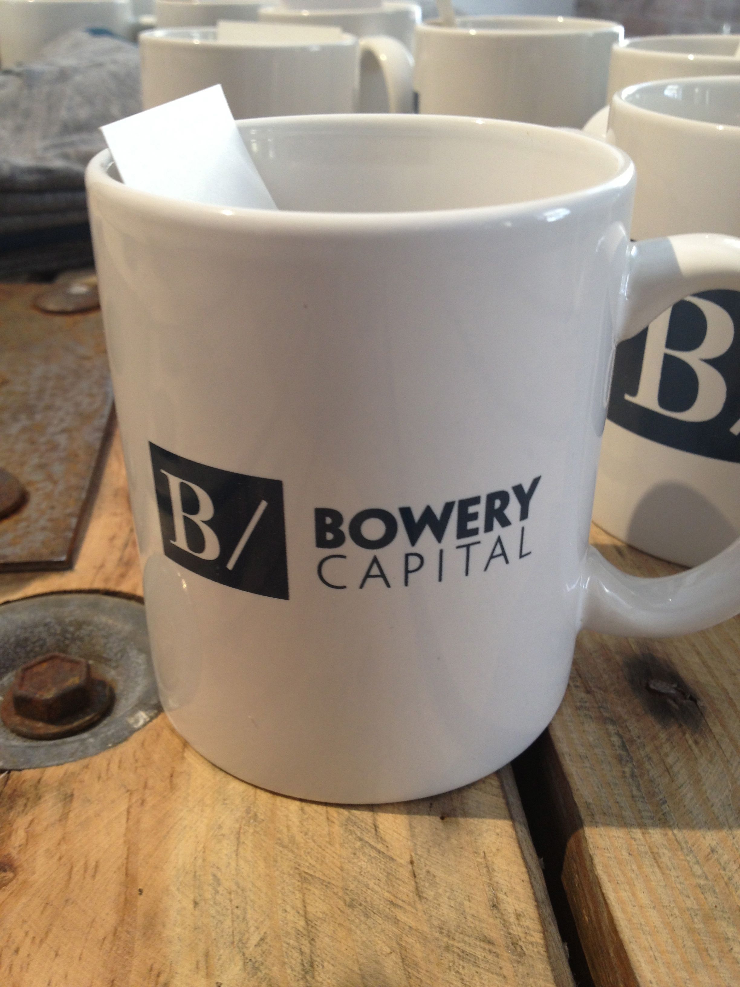A mug with a logo that isn't Aol Ventures. 