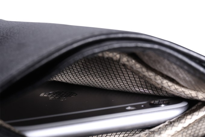 SilentPocket_sps-mbl v2 medium sleeve black leather macro details inside with iPhone 6 plus refelction of shielding 2