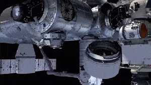 The space station's Canadarm placing BEAM onto Node 3 / Courtesy of NASA