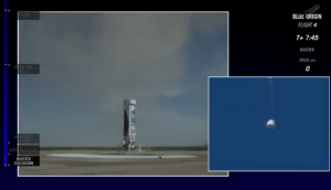 Blue Origin's New Shepard vehicle touches down as the crew capsule begins its descent / Screenshot of live Blue Origin webcast