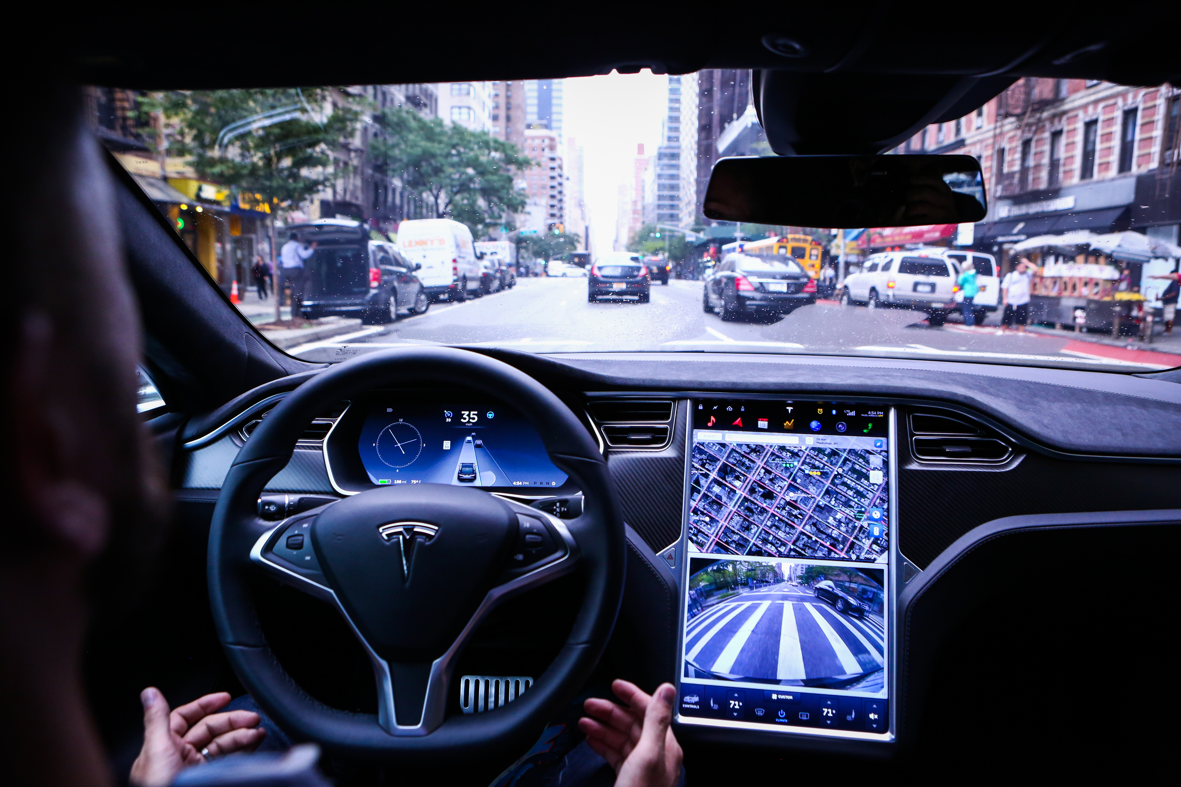 Connected cars from Tesla share information with a neural network that informs decisions made by autopilot