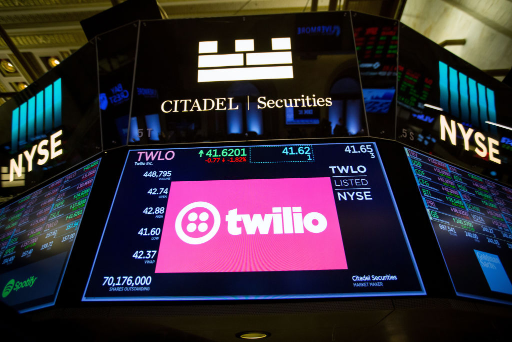 A monitor displays Twilio Inc. signage on the floor of the New York Stock Exchange (NYSE) in New York, U.S., on Friday, April 27, 2018. U.S. stocks were mixed as euphoria from better-than-forecast earnings reports faded with investors contemplating the implications of higher interest rates in an economy that may be cooling. Photographer: Michael Nagle/Bloomberg via Getty Images