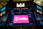 A monitor displays Twilio Inc. signage on the floor of the New York Stock Exchange (NYSE) in New York, U.S., on Friday, April 27, 2018. U.S. stocks were mixed as euphoria from better-than-forecast earnings reports faded with investors contemplating the implications of higher interest rates in an economy that may be cooling. Photographer: Michael Nagle/Bloomberg via Getty Images
