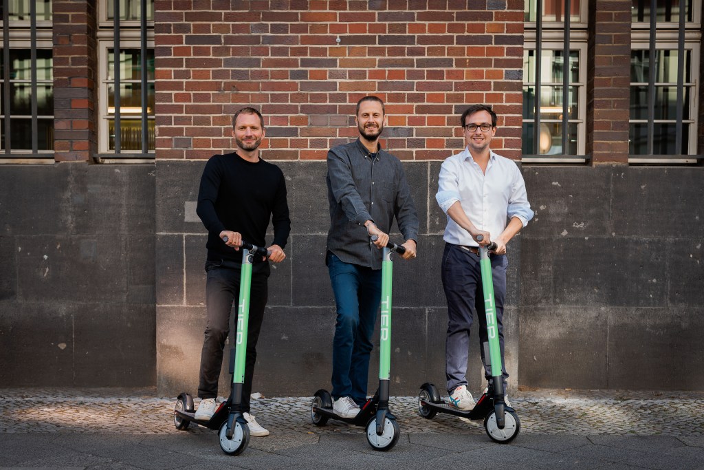 three founders of tier mobility on e-scooters