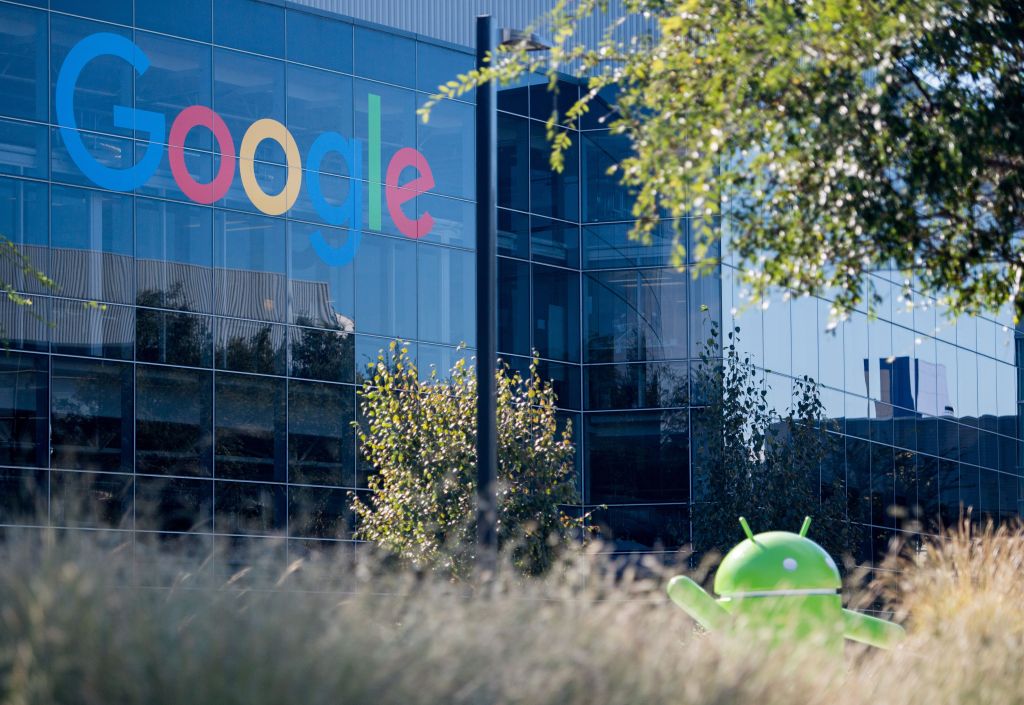 A Google logo and Android statue are seen at the Googleplex in Menlo Park,.