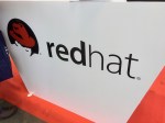 Red Hat logo on booth