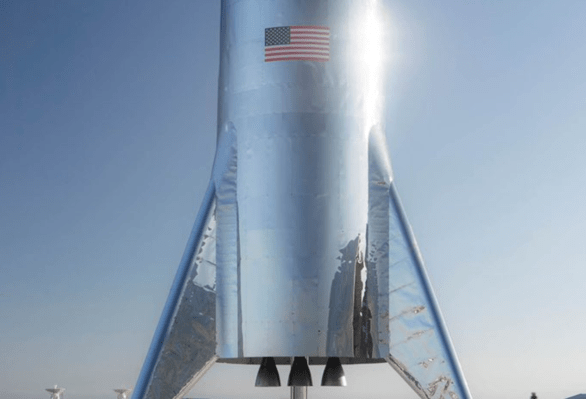 photo of Elon Musk shows off the assembled Starship test rocket image