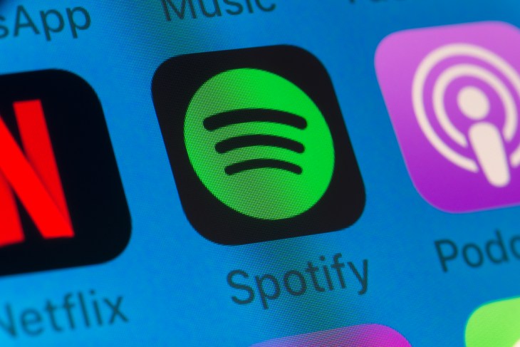 Spotify, Podcasts, Netflix and other cellphone Apps on iPhone screen