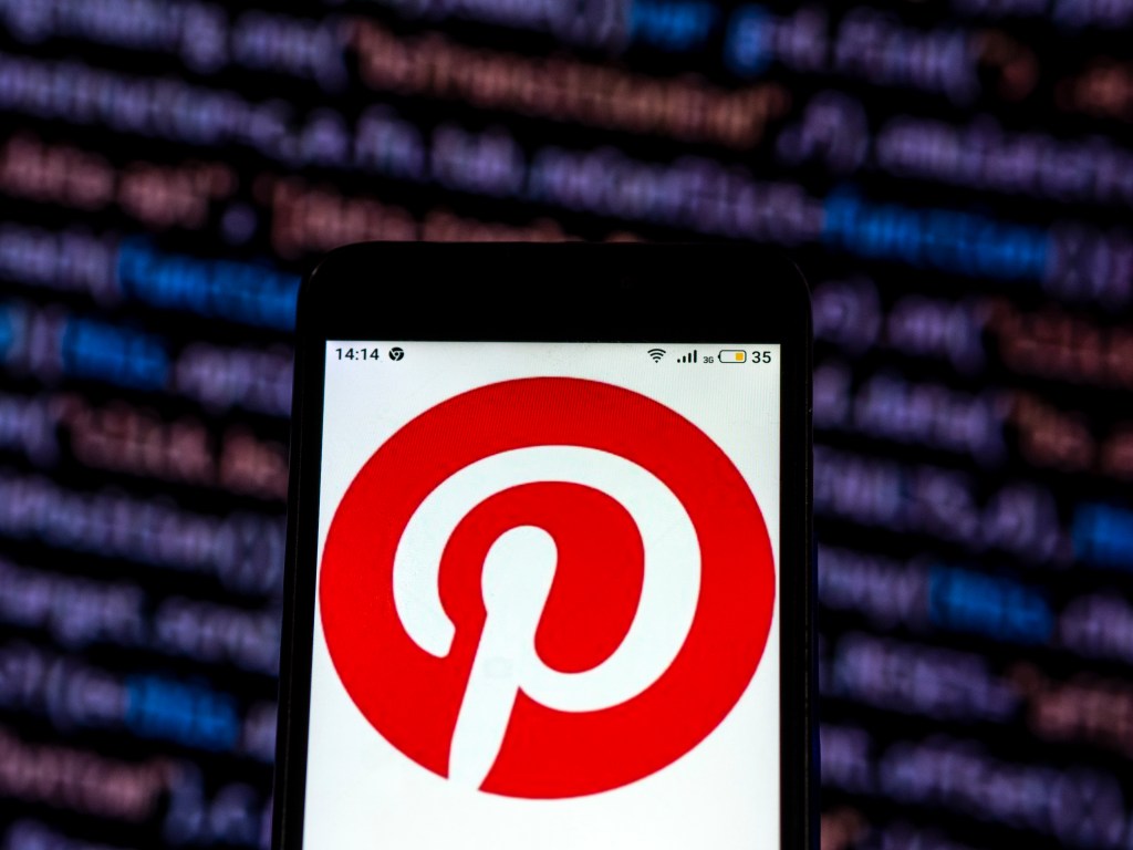 Pinterest Social network logo seen displayed on smart phone.