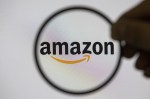 Amazon logo under a magnifying glass