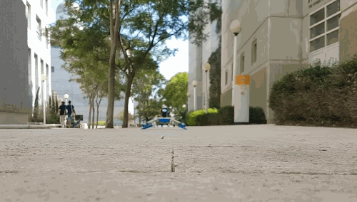 This clever transforming robot flies and rolls on its rotating arms