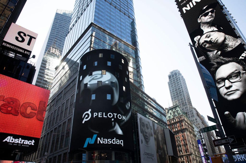 The Peloton logo is displayed, center, on the Nasdaq MarketSite