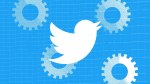 A stock photo featuring Twitter's logo and machine cogs.