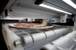 Picnic's automated pizza assembly system