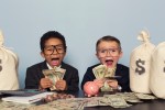 fintech Young Business Children Make Faces Holding Lots of Money