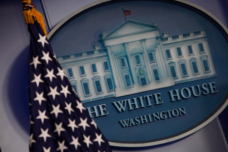 The flag and seal at White House Press briefing, Washington DC, USA