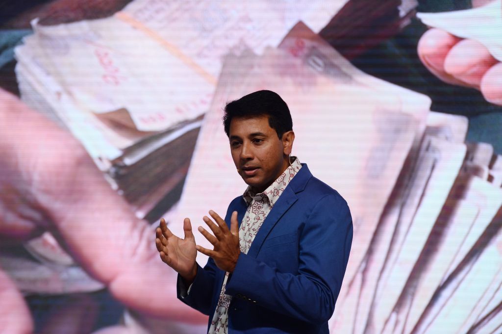 Vice-president of Google's Next Billion Users Caesar Sengupta speaks during the launch of the Google 'Tez' mobile app