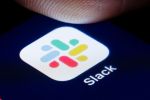 The logo of Instant Messaging Service Slack is shown on the display of a smartphone on April 22, 2020 in Berlin, Germany. (Photo by Thomas Trutschel/Photothek via Getty Images)