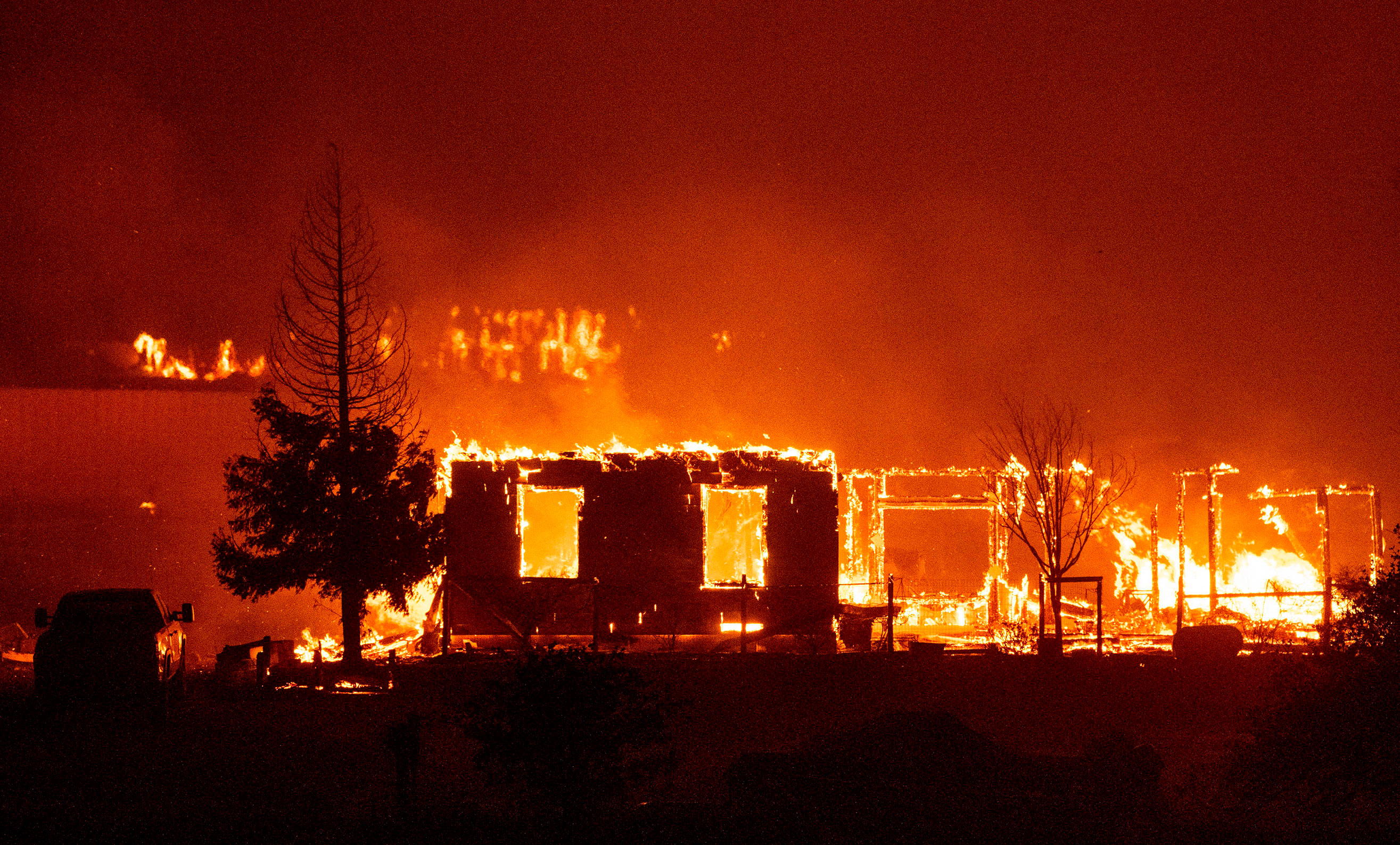 Homes are engulfed in flames in Vacaville, California during the LNU Lightning Complex fire on August 19, 2020.