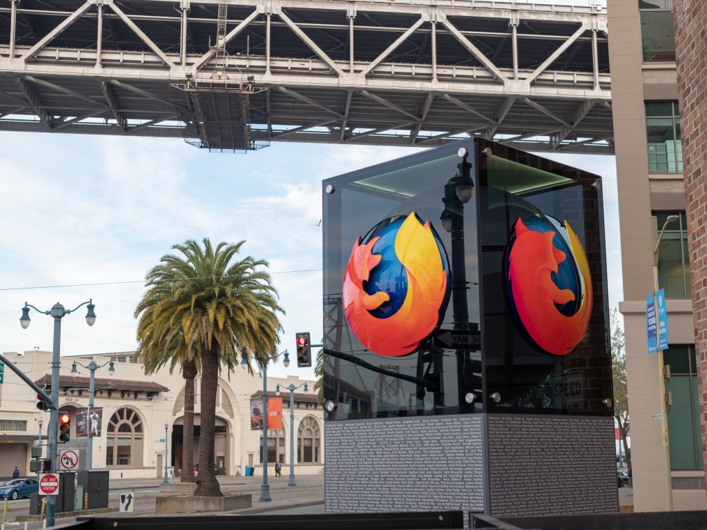 Mozilla Firefox Logo With Palm Trees Outside San Francisco In The Background Mozilla Firefox Logo With Palm Trees Outside San Francisco In The Background