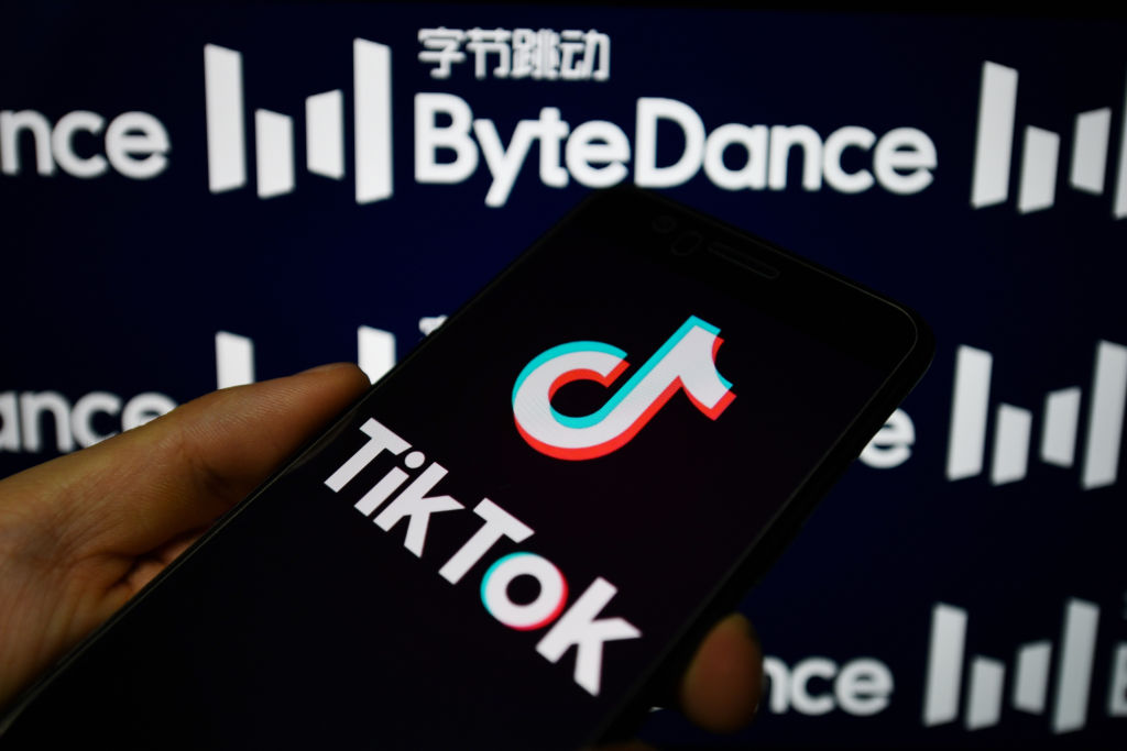 In this photo illustration a TikTok logo is seen displayed on a smartphone with a ByteDance logo on the background. (Photo Illustration by Sheldon Cooper/SOPA Images/LightRocket via Getty Images)