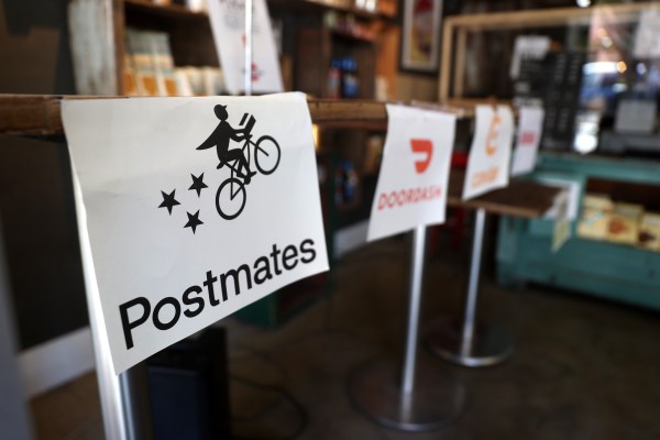 Postmates cuts losses in Q2 as it heads towards tie-up with Uber – TechCrunch