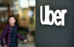 An Uber logo is seen on a sign outside the company's headquarters