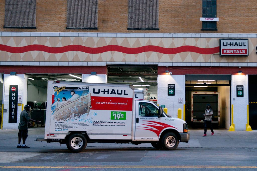 NEW YORK, NEW YORK - AUGUST 01: A Uhaul van is seen outside a rental depot in Chelsea as the city continues Phase 4 of re-opening following restrictions imposed to slow the spread of coronavirus on August 01, 2020 in New York City. The fourth phase allows outdoor arts and entertainment, sporting events without fans and media production. (Photo by Alexi Rosenfeld/Getty Images)