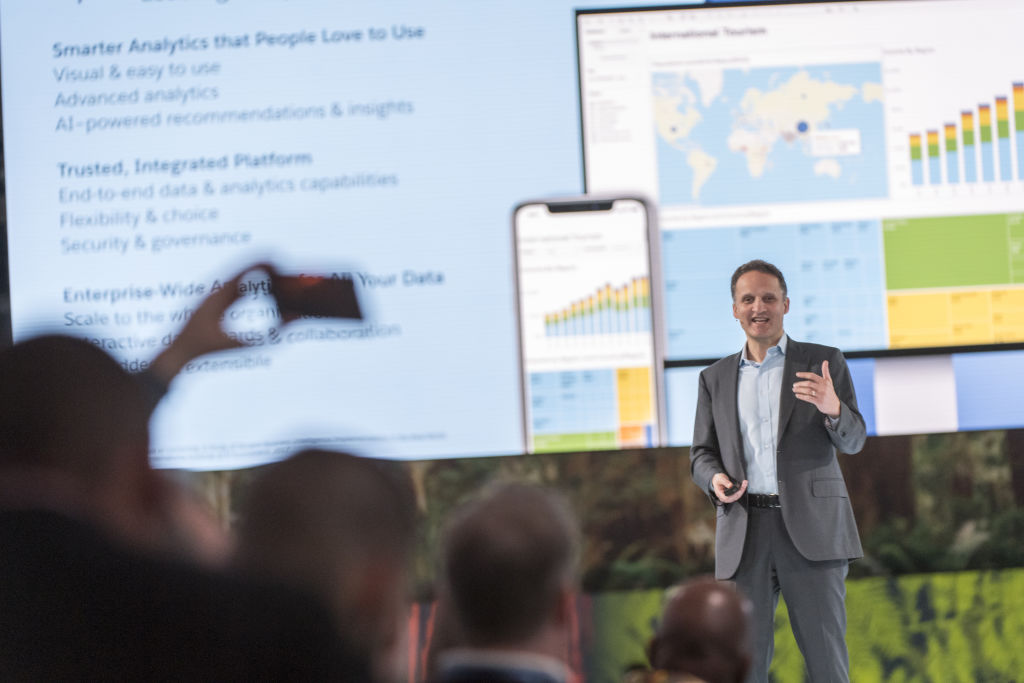 Adam Selipsky, chief executive officer of Tableau Software Inc., speaks during the opening keynote of the 2019 DreamForce conference in San Francisco, California, U.S., on Tuesday, Nov. 19, 2019. Salesforce.com Inc.s annual software conference, where it introduces new products and discusses its commitment to social causes, was interrupted for the second year in a row by protests against the companys work with the U.S. government. Photographer: David Paul Morris/Bloomberg via Getty Images