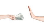 Stop corruption concept. Man refusing money given by female hand, isolated on white