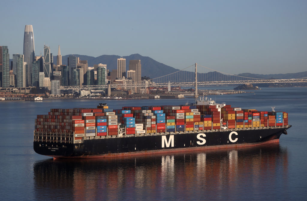 SAN FRANCISCO, CALIFORNIA - MARCH 26: A fully loaded container ship sits idle in the the San Francisco Bay just outside of the Port of Oakland on March 26, 2021 in San Francisco, California. As the global pandemic has fueled online shopping and international shipping to fulfill orders, metal shipping containers have become scarce and have caused log jams at ports around the globe. Also, more than 200 vessels are also stuck outside the Suez Canal after a container ship got stuck sideways in the waterway and is disrupting global shipping. (Photo by Justin Sullivan/Getty Images)