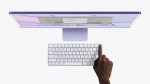 Apple Touch ID on magic keyboard in front of 2021 iMac