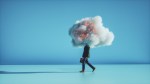 Image of a man walking with a cloud of security issues over his head.