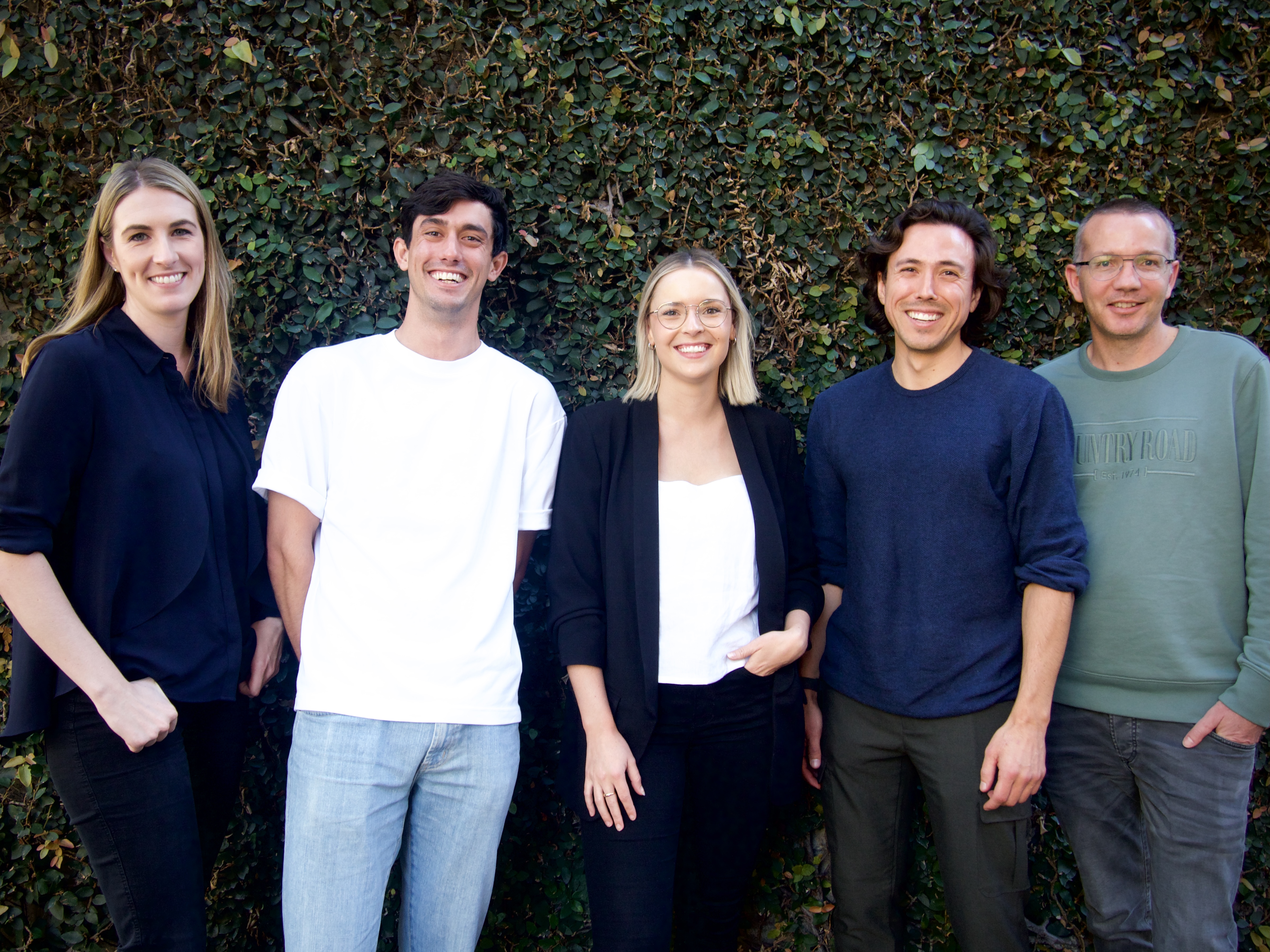 A group photo of The Fund Australia’s team (left to right): Elicia McDonald, Adrian Petersen, Georgia Vidler, Ed Taylor and Todd Deacon