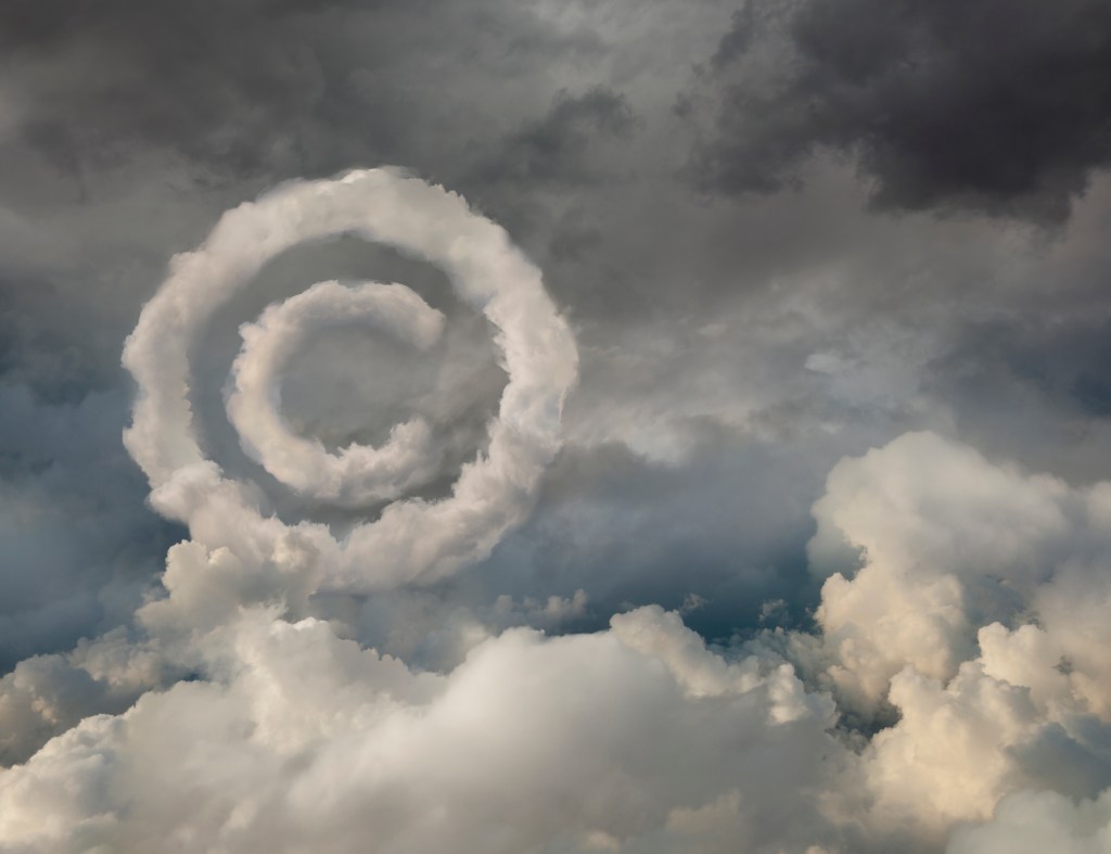 Image of a copyright symbol made of clouds.