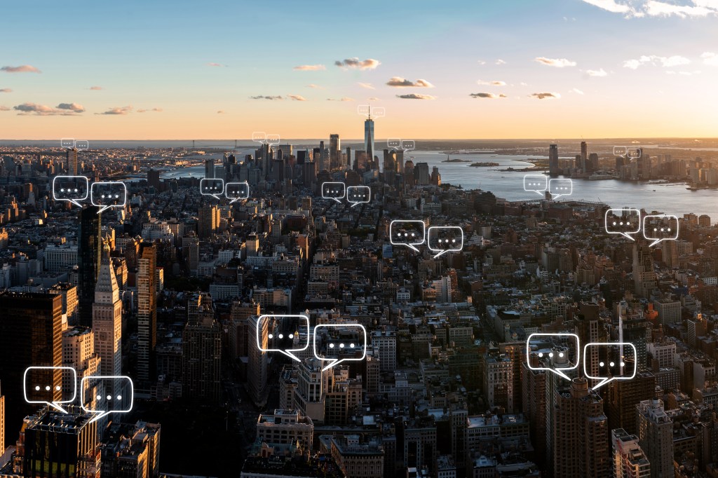 Bubble chat for communication for text on Manhattan skyline in New York City and sky background with bubble chat ,business analysis and strategy as concept