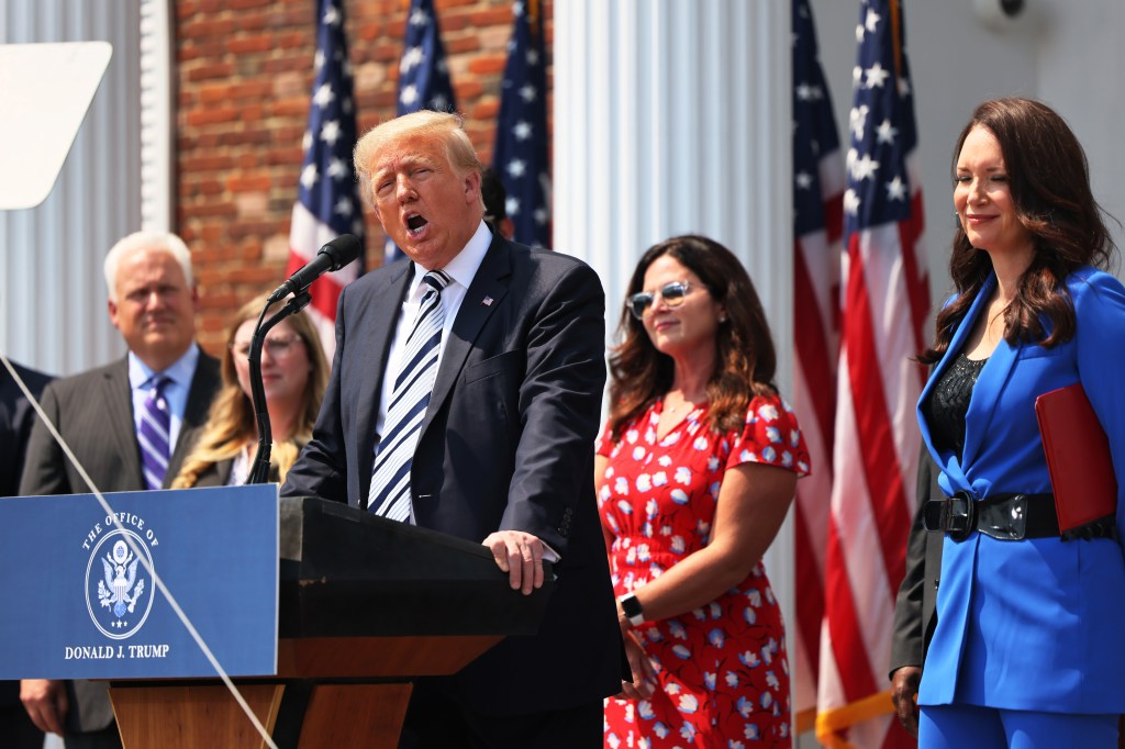 Trump press event at a podium in Bedminster, New Jersey
