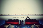 "Once upon a time" written on paper with typewriter