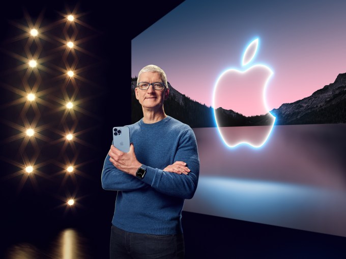 Apple CEO Tim Cook with the iPhone 13 Pro Max and Apple Watch Series 7 during a special event at Apple Park.