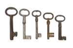 Rusty old keys isolated on a white background.