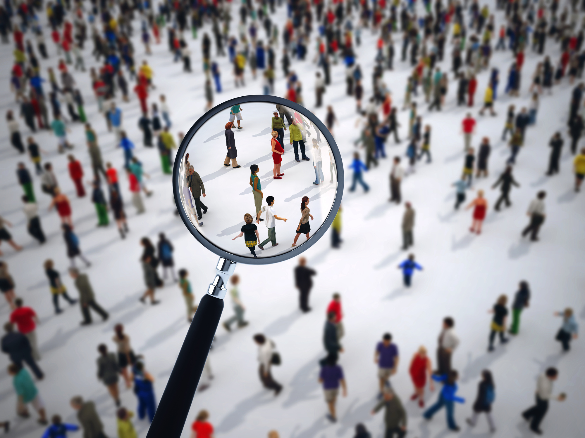 Magnifying glass on a large group of people