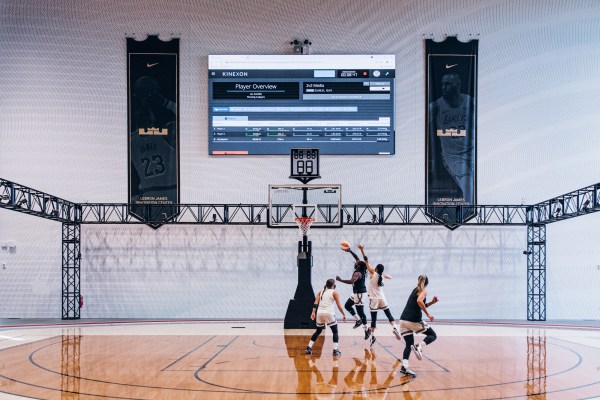 Athletes undergo testing on the basketball court at the Nike Sport Research Lab