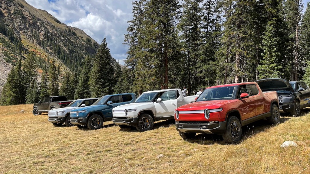 Amazon adds to its Rivian stake