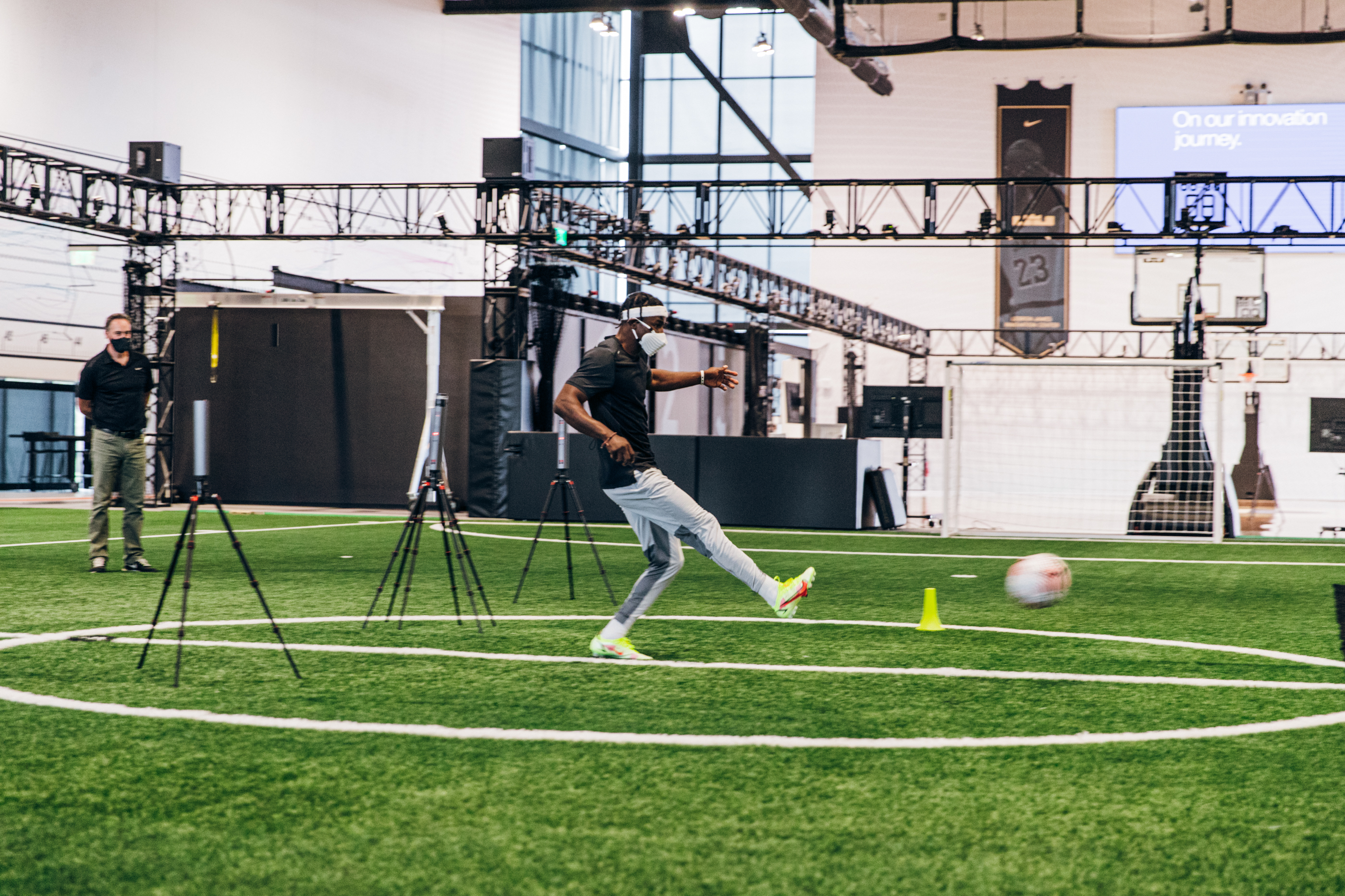 Man simulating a shot at goal in the Nike Sport Research Lab