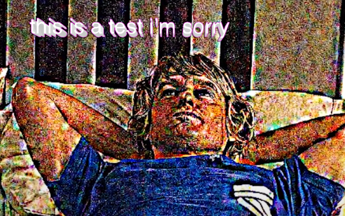 the deep fried owen wilson meme with text added to the top that says this is a test i'm sorry