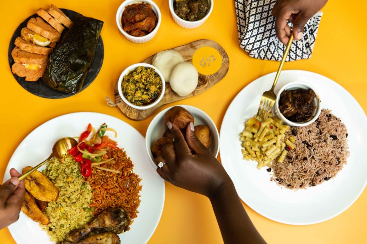 Oja's ethnic groceries app illustrated by a spread of Afro-Caribbean dishes
