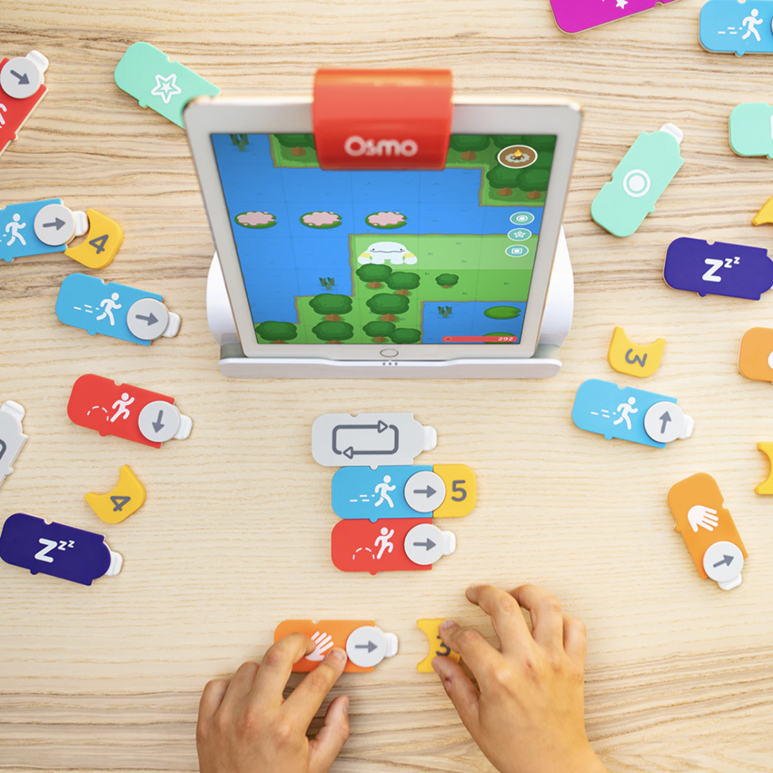 Osmo Explorer Kit STEAM learning device for tablets shown with coding blocks in play