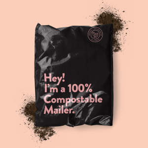 black noissue eco-mailer that says hey im a 100% compostable mailer