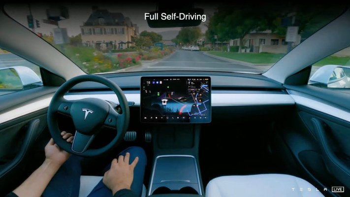 tesla full self driving beta features an assertive mode with rolling stops