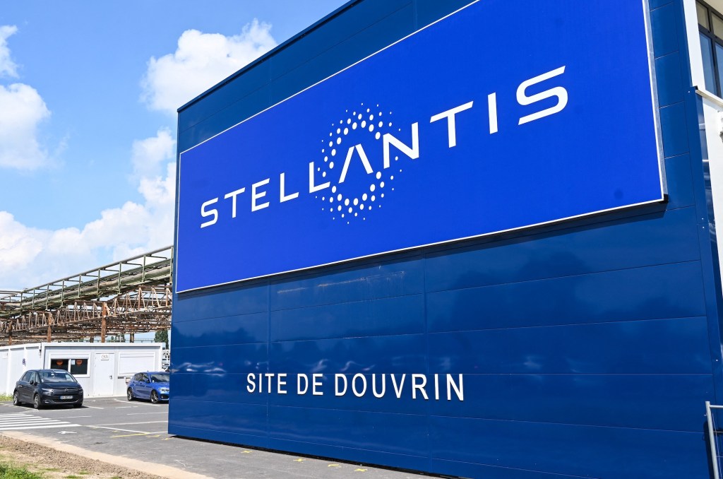 sign at the entrance of the plant of Dutch multinational automotive manufacturing company Stellantis